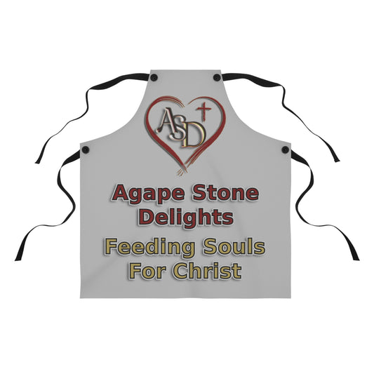 Gray apron with 'Agape Stone Delights' text and logo on a white background